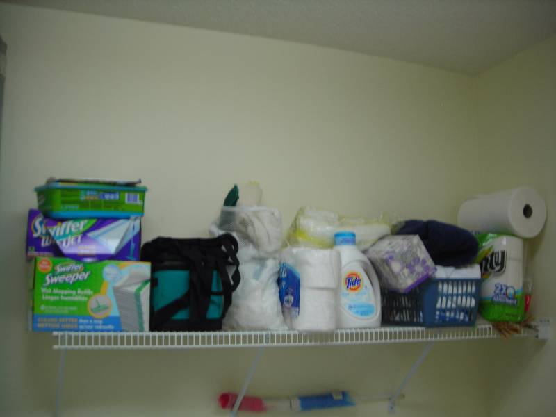 lot 94 image: Shelf Of Supplies In Laundry Room