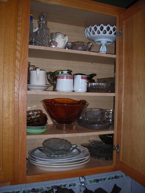 lot 150 image: Contents Of Cabinet-Milk Glass Filigree Compote, Relish & Deviled Egg Plates