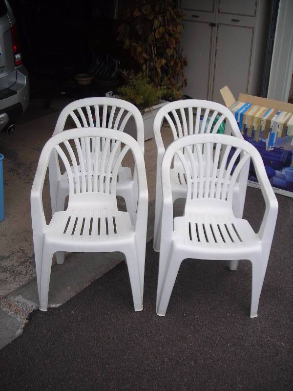 lot 159 image: 4-Plastic Stacking Patio Chairs