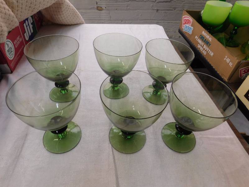 6 matching green stemware glasses