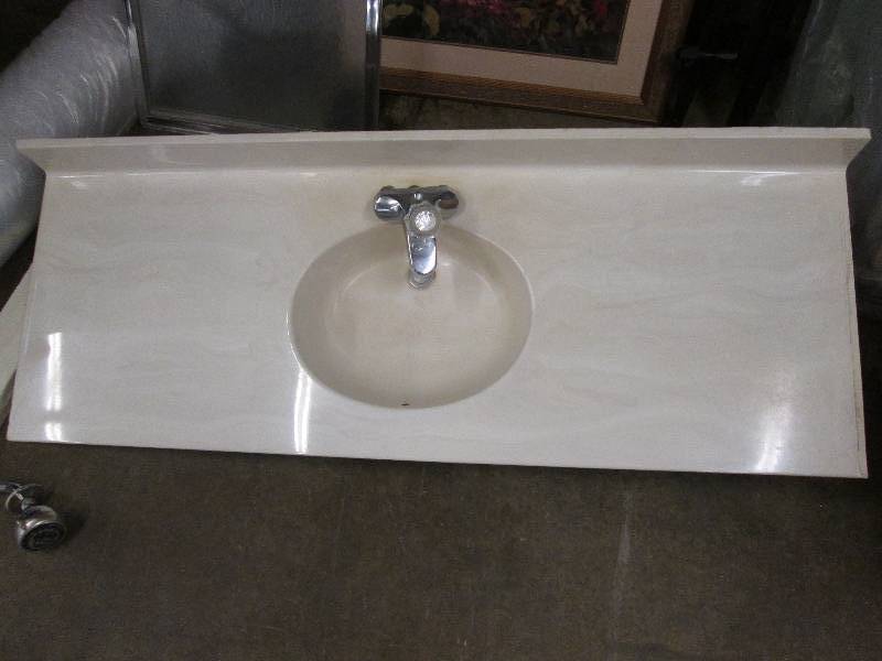 Bathroom vanity top with built in s...