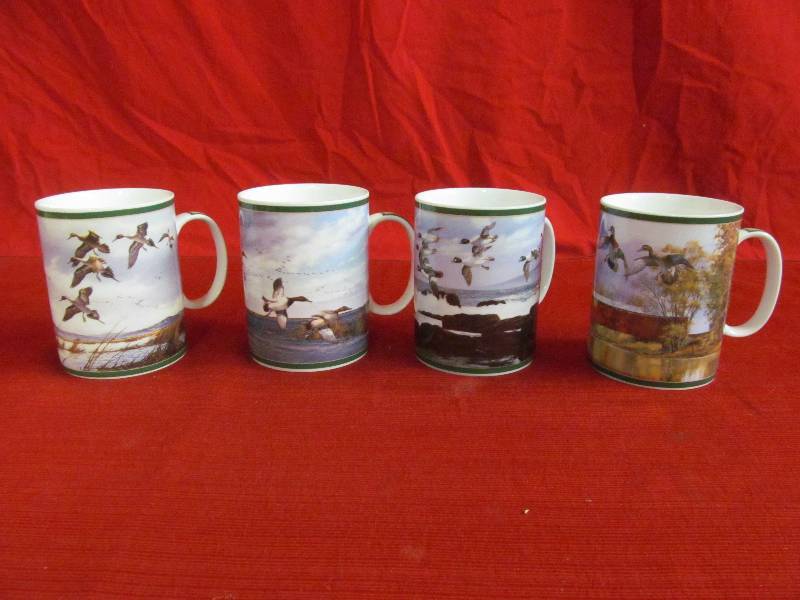 lot 57 image: Danbury mint collectible mugs