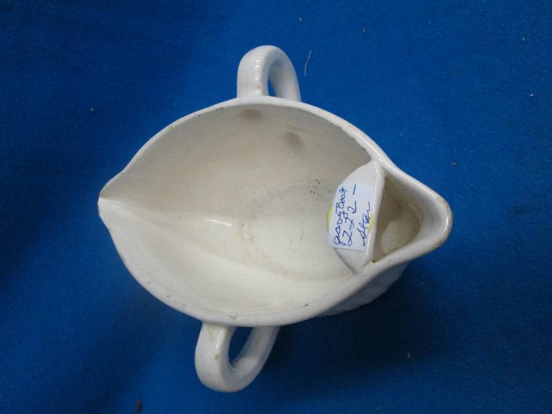 Cream colored gravy bowl ...