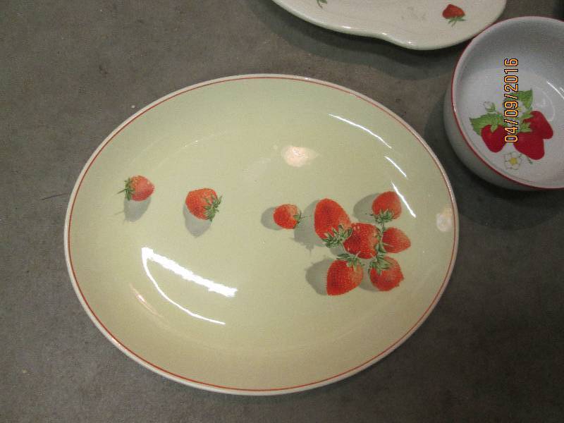 Lot of strawberry themed dishes...
