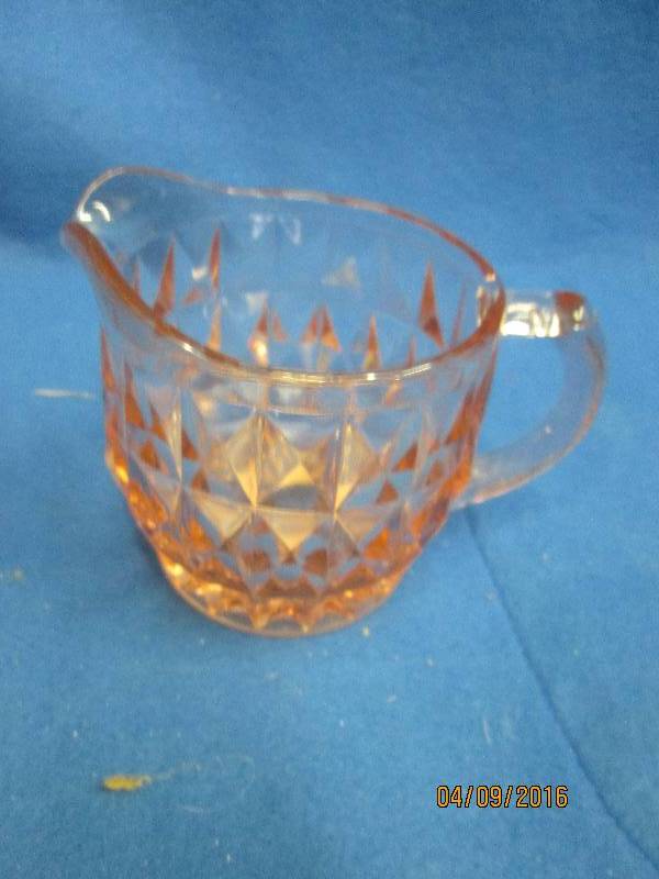 Pink glass creamer...
