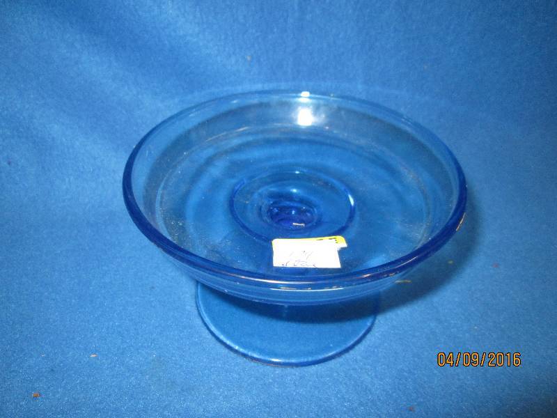 Blue glass stemmed candy dish...