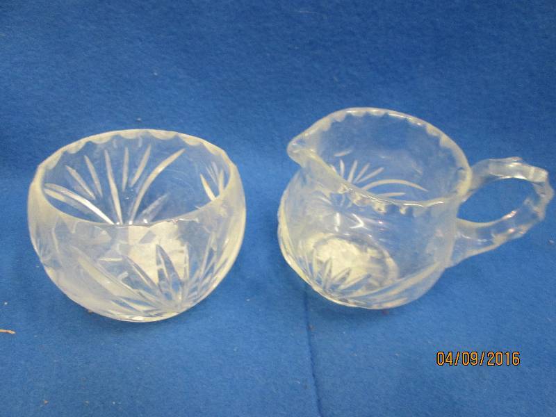 Cut glass cream and sugar bowl...