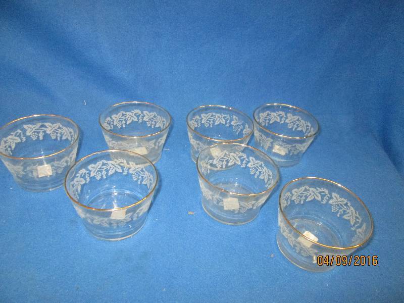 Lot of gold rimmed crystal glasses...