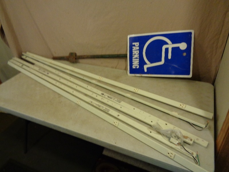 lot 102 image: Handicap Sign and Plug Mold Outlet Strips