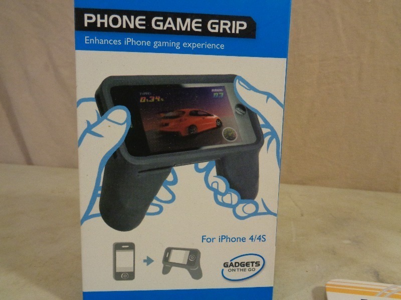 lot 140A image: New Phone Game Grip and New MP3 Jacket