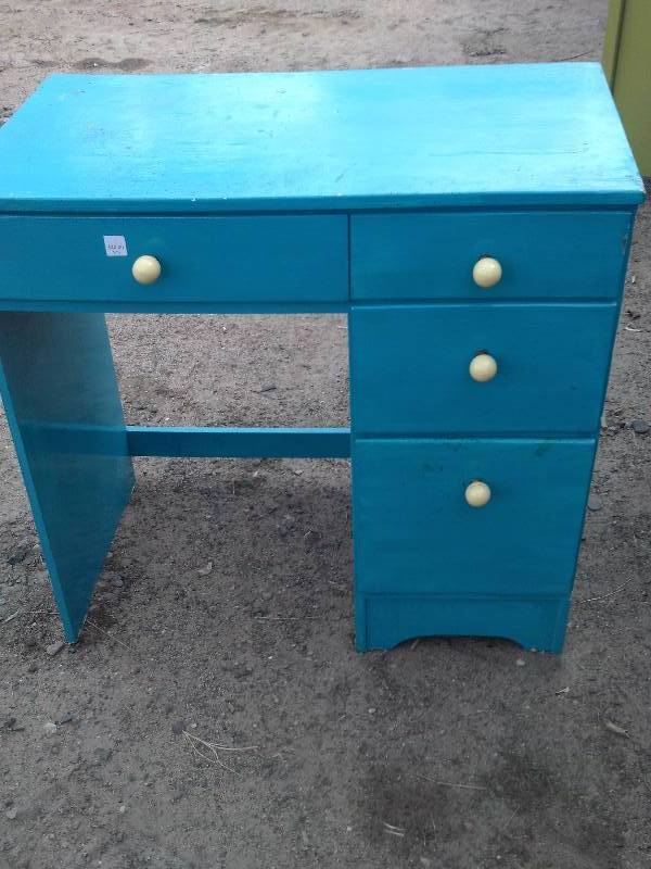 blue desk with antique knobs