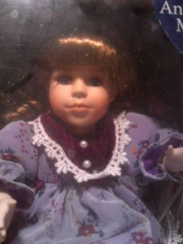 collectible classic treasures porcelian dol