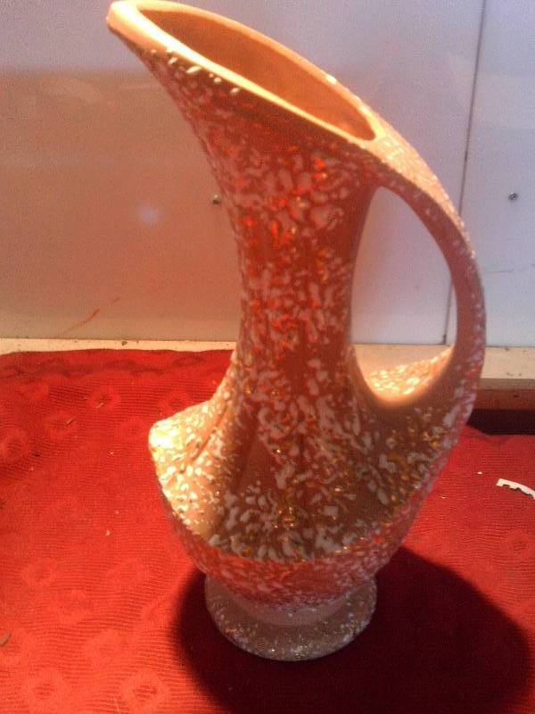 textured clay pitcher