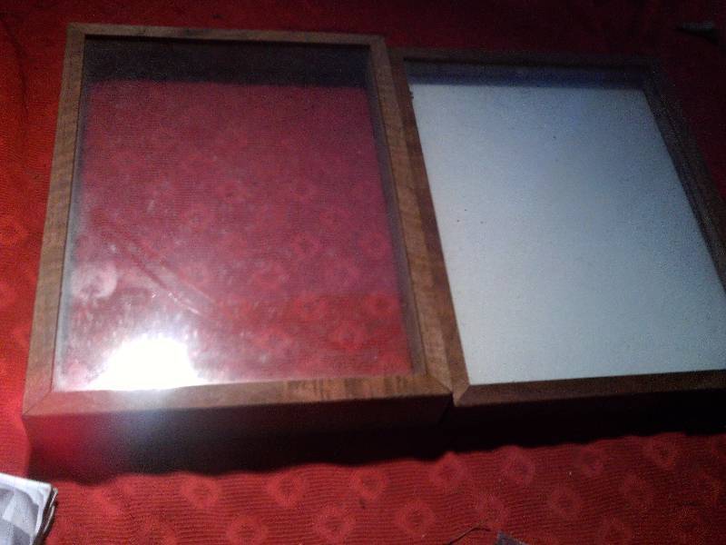 2 wood framed memory boxes