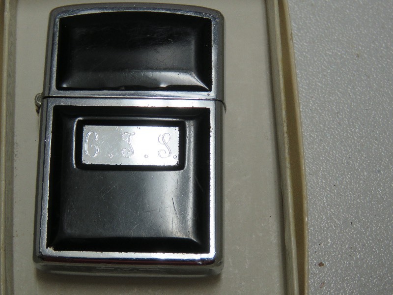 two vintage Zippo lighters