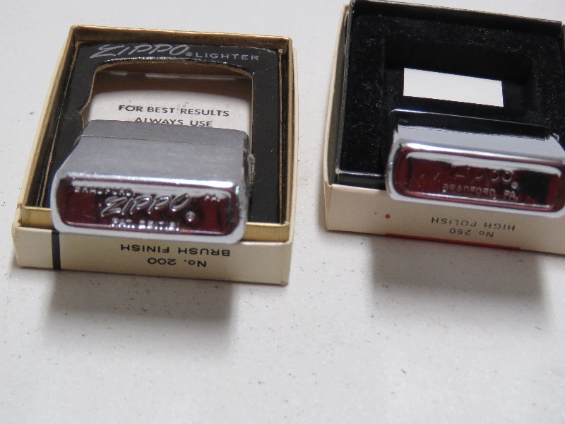two vintage Zippo lighters