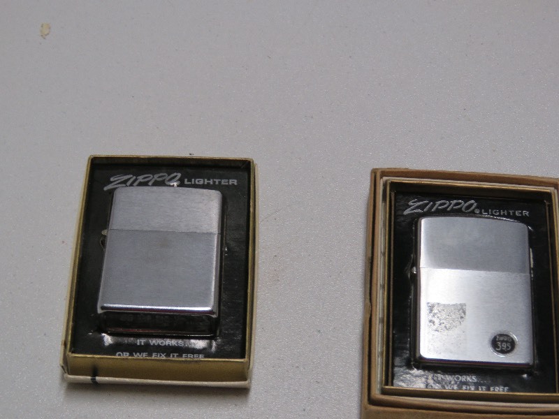 two vintage Zippo lighters