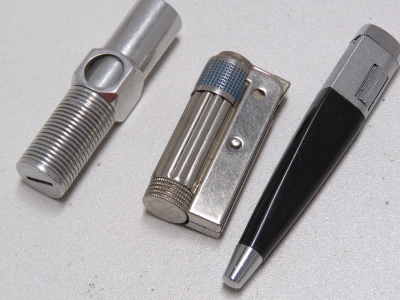 three misc. electronic lighters