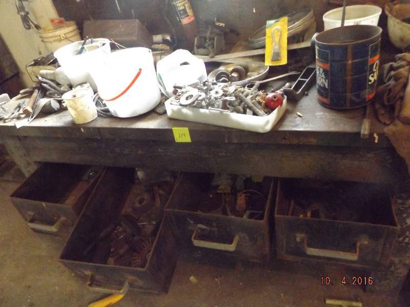 vintage wood work bench with contents