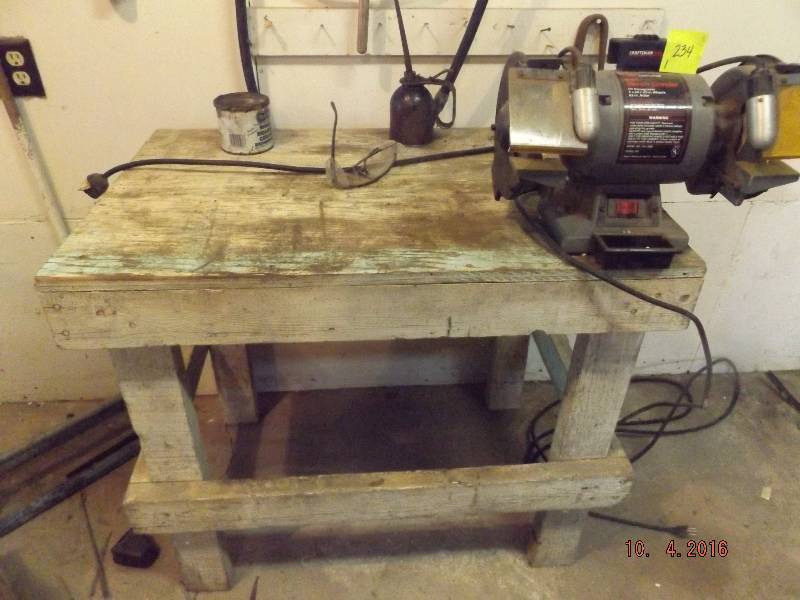 nice bench grinder includes bench and contents.