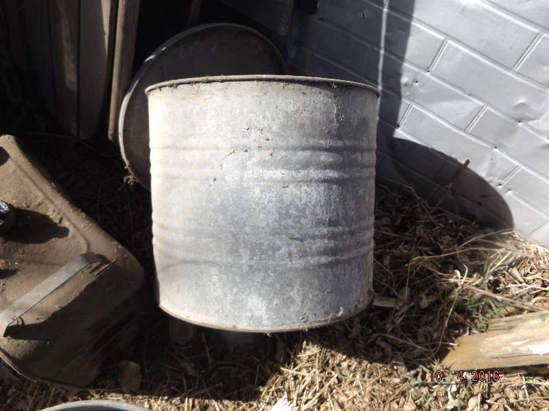 galvanized pail with petcock and glass bowl