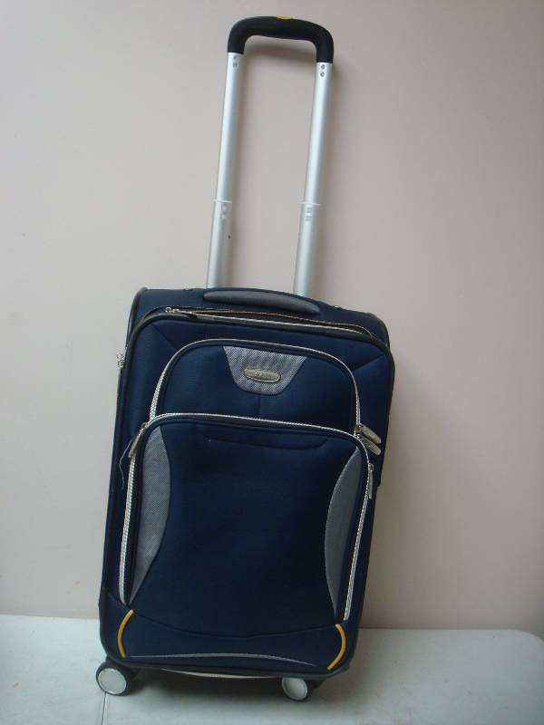 Blue Rolling Suit Case Bag...