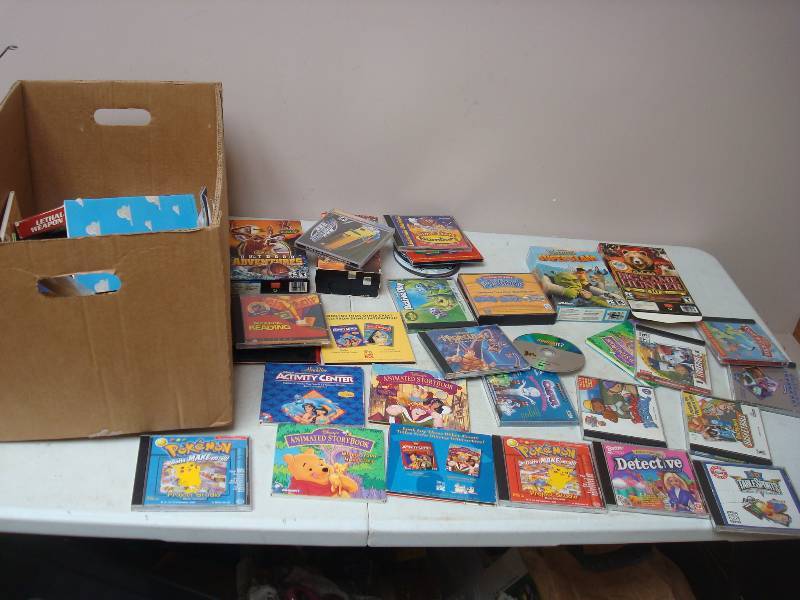 Box Filled With CD Rom Game Programs...