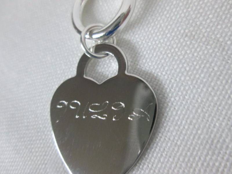 lot 64 image: Silvertone Personalized Heart Charm Bracelet