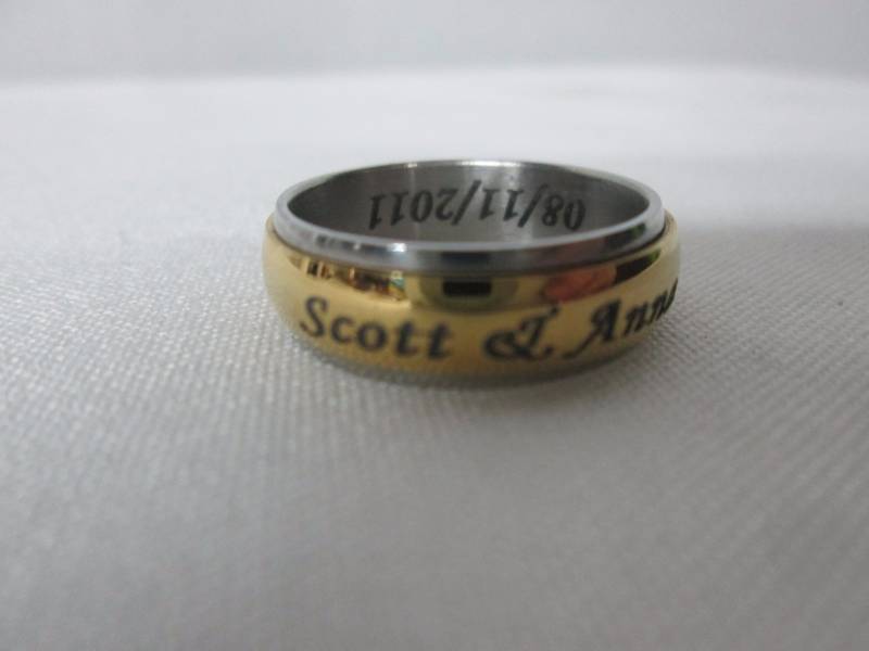 lot 66 image: Mens Stainless Steel Personalized Couples Spinner Band