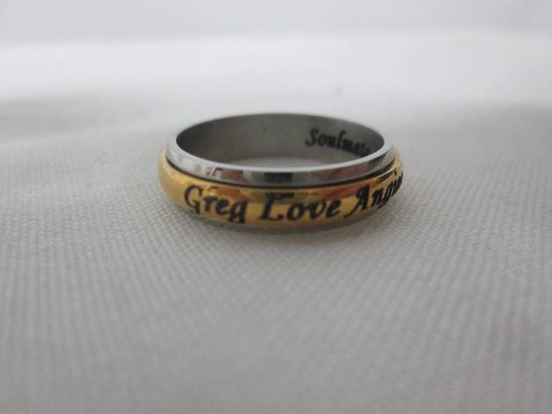 lot 71 image: Ladies Stainless Steel Personalized Couples Spinner Band