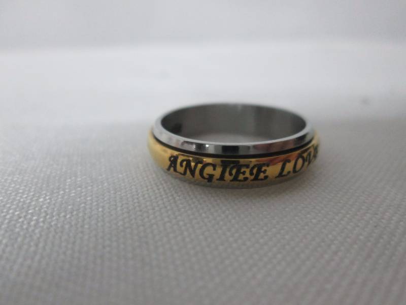 lot 72 image: Ladies Stainless Steel Personalized Couples Spinner Band