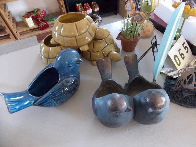 SPRING AND GARDEN GIFT WARE, PLANTERS,WNID CHIMES, BIRD FEEDERS, GNOMES AND SOLAR FAIRIES