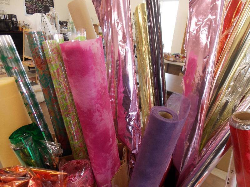POLY BACK FOIL ASSORTED COLORS, MYLAR ROLLS AND FLATS CELLOPHANE ROLLS CLEAR AND PATTERNED