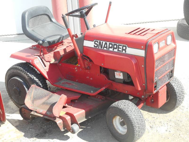 lot 8 image: Snapper Lawn Tractor With Mower Deck & Snowblower Set