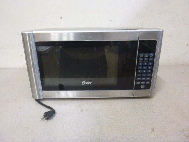 lot 43 image: Oster Microwave