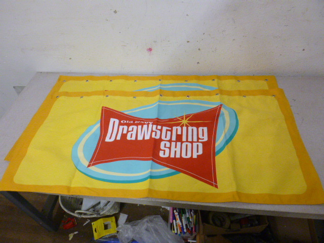 lot 123 image: 2 Old Navy Canvas Banners