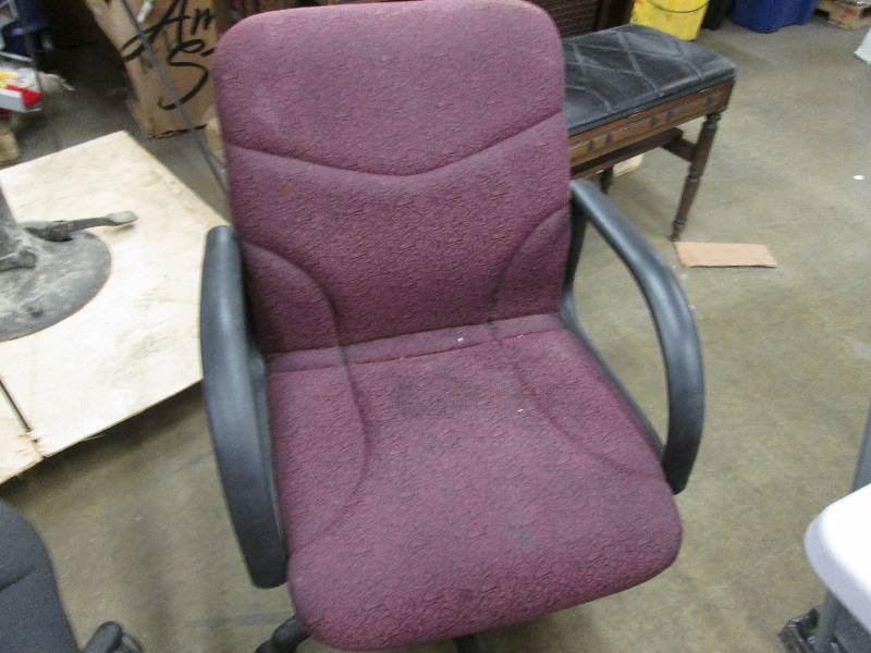 Dark red patterned office chair wit...