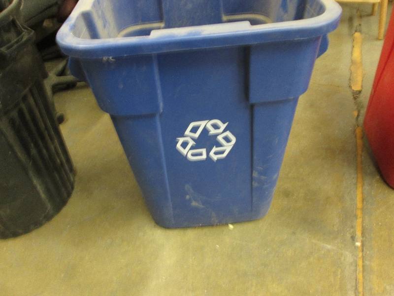 Large blue recycling bin...