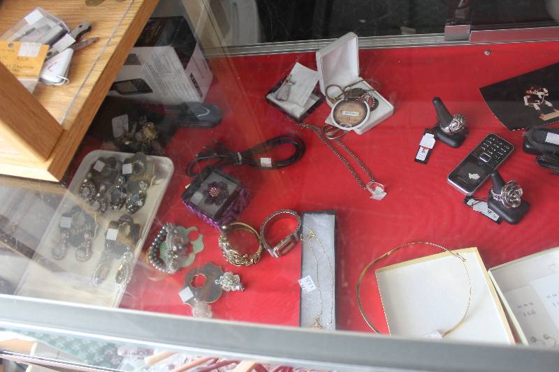 Contents of Display Case Including Jewelry