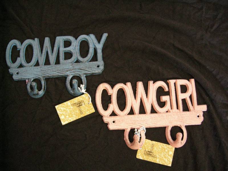 lot 71 image: Cast Cowboy-Cowgirl Hooks