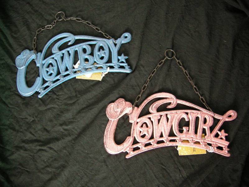 lot 34 image: Cast Cowboy - Cowgirl hangers