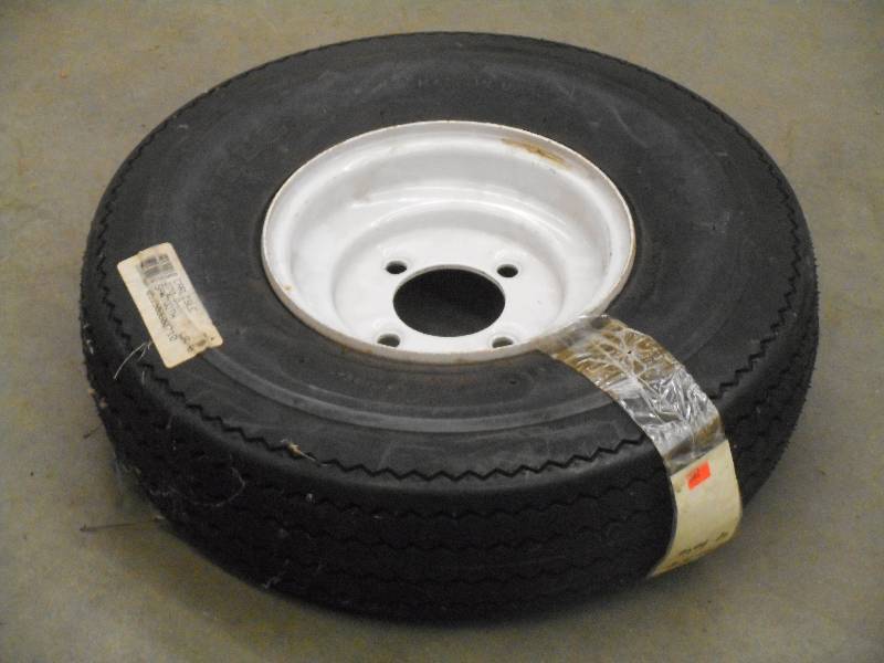 lot 74 image: Carlisle 5.708 Trailer Tire On 4-L...
