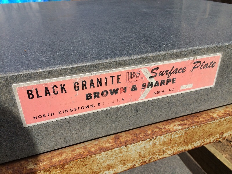 One Black Granite  Surface Plate  Iron stand  (no other contents included)  Measures (surface plate) 36 x 24  (stand) 37 x 26 x 30 high