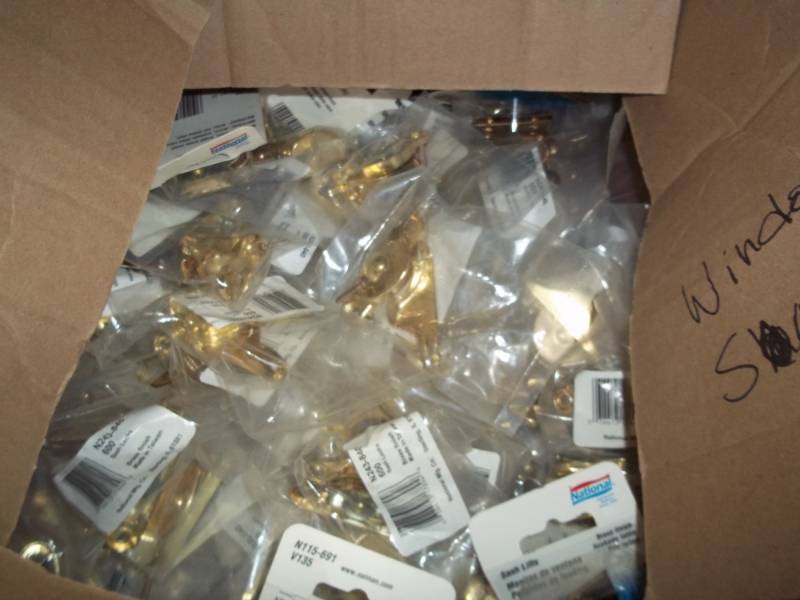 lot 42 image: New box of window hardware latches and sash hardware