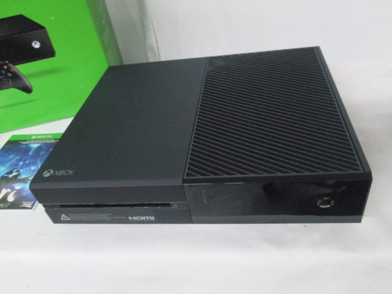 lot 7 image: XBOX One 500GB Console w Gears of War