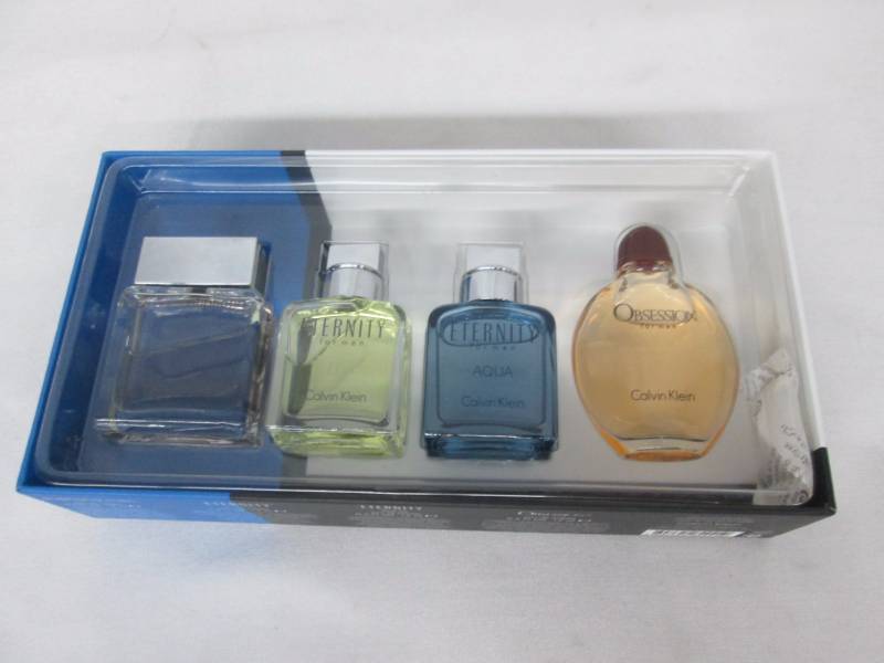 lot 55 image: Calvin Klein 4-pc. Mini Coffret