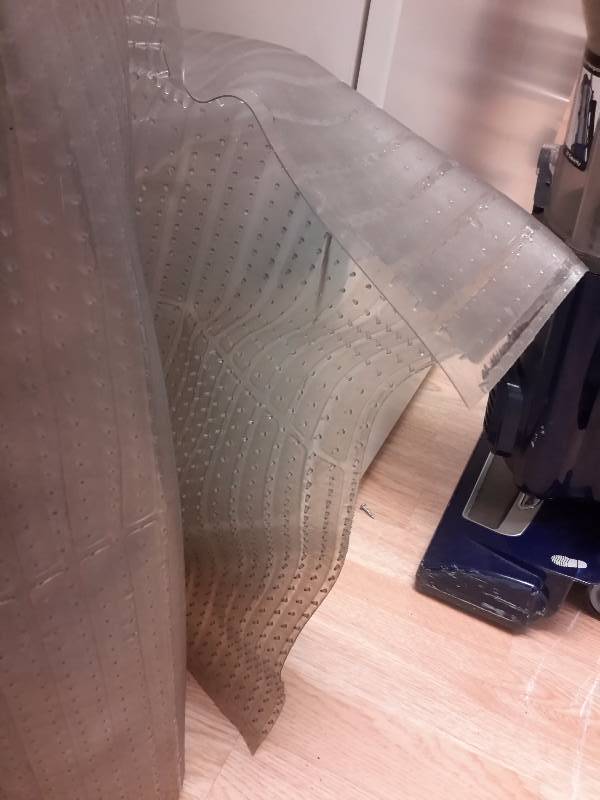 lot 35 image: 2 Rolls of 20 ft heavy plastic floor Runners..