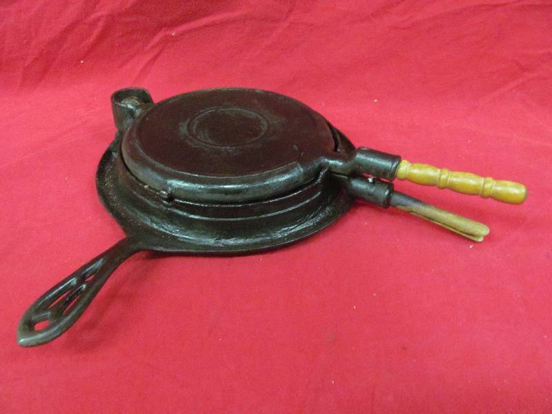 lot 11 image: cast iron Griswold waffle iron