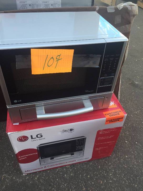 lot 107 image: LG LCSP1110ST 1.1 Cu Ft Counter Top Combo Microwave and Baking Oven, Stainless Steel New