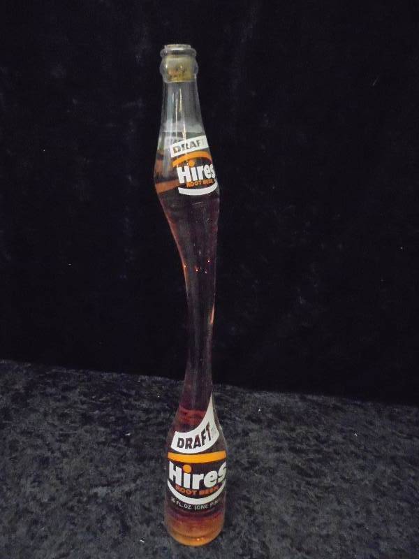 lot 22 image: Vintage Hires Root Beer Stretch Neck Bottle